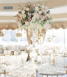 Regal Reception at Oheka Castle
Photography: Lauren Fair Photography
Read More:
http://www.insideweddings.com/weddings/elegant-wedding-with-muted-regal-decor-at-oheka-castle-in-new-york/1243/ oheka castle wedding reception tall centerpiece crystal stand white pink rose orchid brunia berries