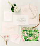 Tropical Invitation Suite
Photography: KT Merry Photography
Read More:
http://www.insideweddings.com/weddings/a-gorgeous-and-elegant-outdoor-florida-wedding/536/ Tropical wedding invitation suite with green fronds and flamingos on the cover and map of Florida