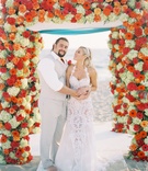 CJ Perry %26 Miroslav Barnyashev Under Arch
Photography: Lucy Munoz Photography
Read More:
http://www.insideweddings.com/weddings/cj-perry-and-miroslav-barnyashev/961/ CJ "Lana" Perry and Miroslav "Rusev" Barnyashev on wedding day under arch barefoot groom beach
