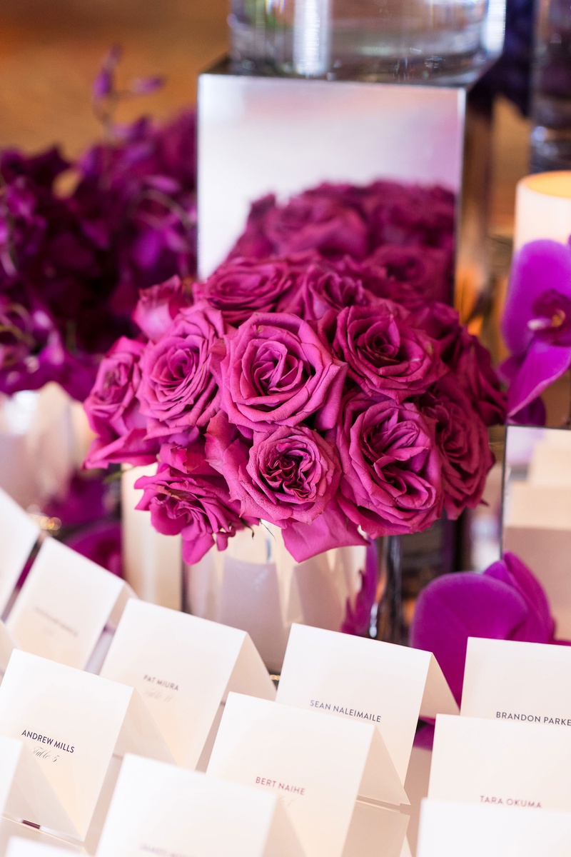 Fuchsia Roses
Photography: Brian Leahy Photography
Read More:
http://www.insideweddings.com/weddings/a-hawaiian-couples-luxurious-destination-wedding-in-las-vegas/1226/ escort card table with fuchsia flowers, orchids, purple orchids