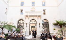Ceremony on Front Steps
Photography: Larissa Cleveland Photography
Read More:
http://www.insideweddings.com/weddings/intimate-san-francisco-wedding-with-art-deco-inspired-elements/1359/ james leary flood mansion san francisco wedding ceremony, guests seated during vows