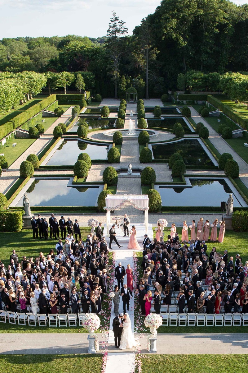 Recessional at Oheka Castle
Photography: Brett Matthews Photography
Read More:
http://www.insideweddings.com/weddings/regal-outdoor-ceremony-ballroom-reception-at-oheka-castle-in-ny/821/ Wedding recessional on grounds of Oheka Castle in Huntington, New York