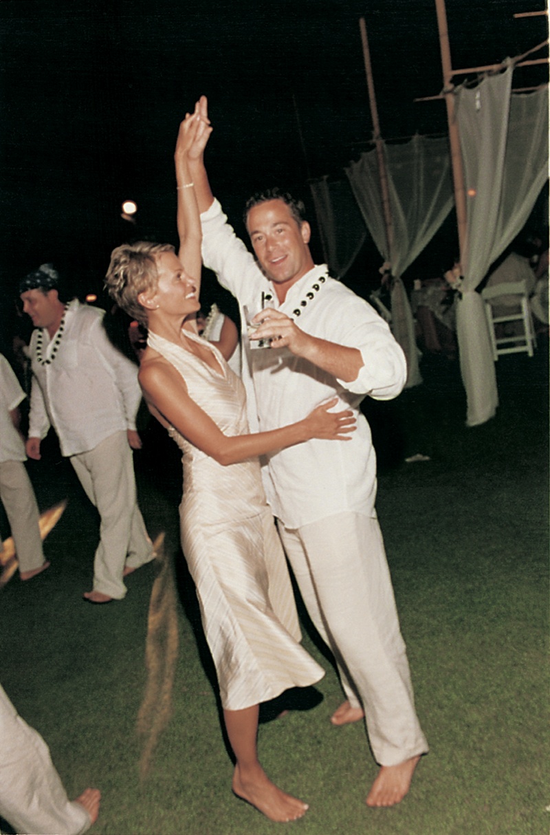 Guests Dance on Lawn
Photography: David Michael Photography
Read More:
http://www.insideweddings.com/weddings/tropical-seaside-wedding-in-lanai-hawaii/60/ wedding guests dance at wedding on grass