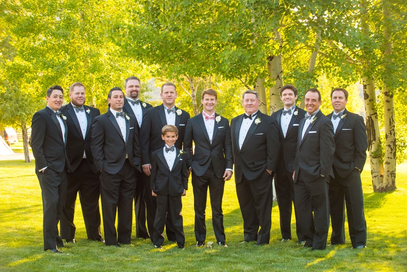 Aspen Groom with Groomsmen
Photography: Brett Butterstein Photography
Read More:
http://www.insideweddings.com/weddings/incredible-tented-ceremony-barn-reception-at-ranch-in-aspen/860/ Groom in pink bow tie with groomsmen and ring bearer in blue grey bow ties