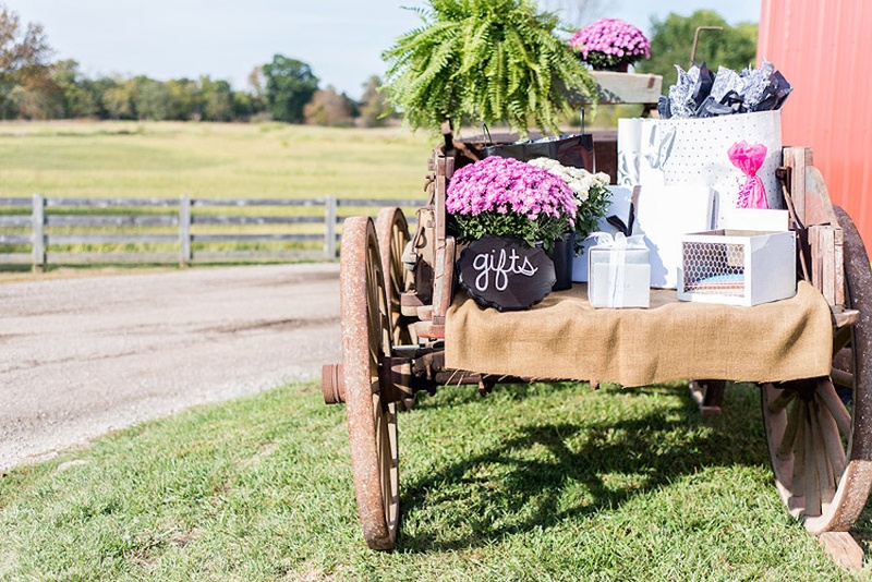 Wagon Gift Station
Photography: Stacy Newgent
Read More:
http://www.insideweddings.com/weddings/rustic-barn-wedding-tented-reception-on-family-farm-in-ohio/690/ Wedding gifts on rustic wagon at farm wedding