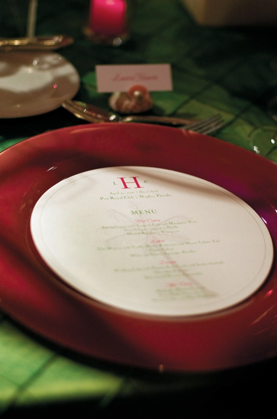 Green and Pink Circle Menu
Photography: Mermin + Christie Photographers
Read More:
http://www.insideweddings.com/weddings/tropical-theme-beach-wedding-in-naples-florida/184/ circle shaped menu with green and pink lettering on red charger