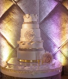 Classic Cake with Modern Twist
Photography: Karlisch Photography %26 f8studio
Read More:
http://www.insideweddings.com/weddings/glamorous-new-years-eve-wedding-at-a-science-museum-in-dallas/960/ wedding cake with varying sizes of layers
