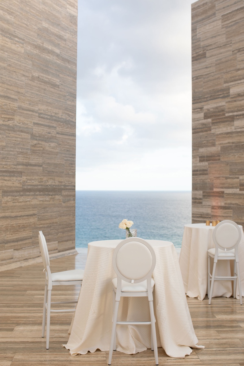 Modern Cocktail Hour Décor
Photography: Collin Pierson Photography
Read More:
http://www.insideweddings.com/weddings/beach-wedding-ceremony-romantic-reception-inspiration-in-cabo/1304/ wedding cocktail hour at modern hotel resort in cabo mexico tall white linen table counter stools