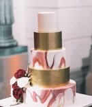 Marble-and-Gold Cake
Photography: Black %26 Hue Photography
Read More:
http://www.insideweddings.com/weddings/church-ceremony-chic-museum-reception-in-palm-beach-florida/1260/ wedding cake, marble burgundy tier, gold tier, white top tier