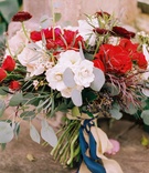 Red %26 White Floral Bouquet, Ribbons
Photography: Meghan Rose Photography
Read More:
http://www.insideweddings.com/weddings/fairy-tale-winter-styled-shoot-inspired-by-beauty-and-the-beast/926/ beauty beast movie styled wedding shoot red white green bouquet ribbons utah fairy tale inspiration