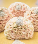 Bridesmaids' Pastel Rose Bouquets with Brooches %26 Pearls
Photography: Chip Gillespie
Read More:
http://www.insideweddings.com/weddings/classic-jewish-wedding-at-a-synagogue-in-houston-texas/718/ Pale pink rose bouquets with strands of pearls & rhinestone brooches for bridesmaids