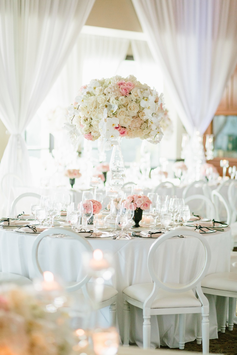 Centerpiece in Classic Hues
Photography: Jodee Debes Photography
Read More:
http://www.insideweddings.com/weddings/elegant-alfresco-ceremony-reception-with-parisian-elements/1176/ classic wedding decor, floral centerpiece with pink, ivory, and