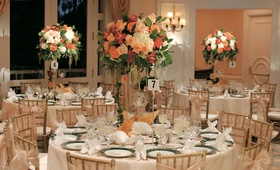 Fall-Themed Reception Décor
Photography: Robert Evans Studios
Read More:
http://www.insideweddings.com/weddings/elegant-fall-wedding-in-beverly-hills-california/23/ Ballroom with round tables and tall centerpieces