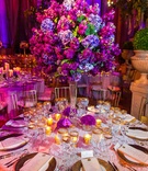 Purple and Gold Tablescape
Photography: Davide DePas
Read More:
http://www.insideweddings.com/weddings/opulent-washington-dc-wedding-with-golden-details/547/ Textured linens with gilt flatware and tall floral centerpiece