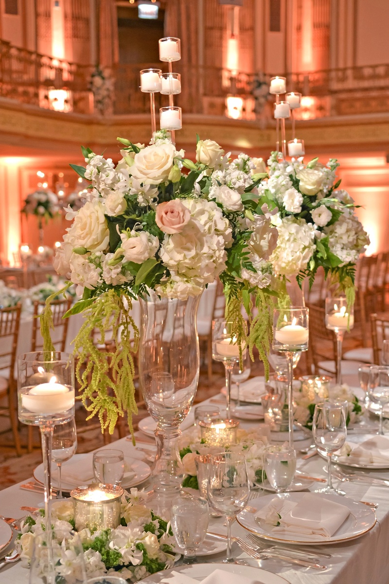 Romantic Floral Centerpieces
Photography: Carasco Photography
Read More:
http://www.insideweddings.com/weddings/bride-wears-custom-ines-di-santo-gown-at-glamorous-chicago-wedding/550/ Cascading amaranths from glass fluted vases