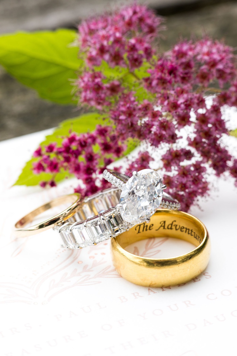 Engraved Men's Band %26 Engagement Ring
Photography: Roey Yohai Studios
Read More:
http://www.insideweddings.com/weddings/romantic-new-york-real-wedding-with-upscale-summer-camp-feel/1327/ oval diamond engagement ring with pave band with eternity band and men's gold wedding ring engraved