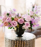 Pink %26 Purple Flowers
Photography: Sarah Pudlo %26 Co
Read More:
http://www.insideweddings.com/weddings/inspirational-wedding-shoot-with-bold-color-scheme-unique-details/1207/ flower arrangement roses in shades of pink and lavender sweet peas, dark vase