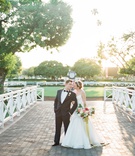 Bride %26 Groom at Racetrack Venue
Photography: Lucas Rossi Photography
Read More:
http://www.insideweddings.com/weddings/traditional-catholic-ceremony-reception-at-a-california-racetrack/1139/ Bride in trumpet wedding dress with groom in tuxedo bow tie at santa anita race track racecourse