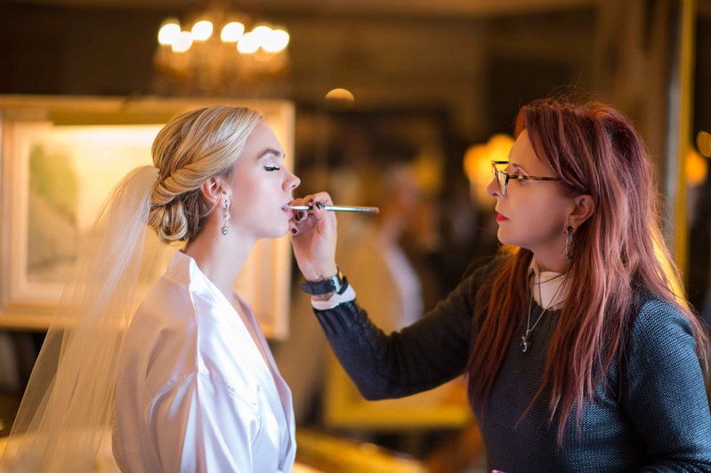 Bride Getting Lipstick Put On
Photography: Carasco Photography
Read More:
http://www.insideweddings.com/weddings/new-york-yankees-infielder-marries-in-opulent-chicago-soiree/764/ Bride with blonde hairstyle getting lips done by makeup artist