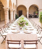 Long Reception Table in Italian Courtyard
Photography: Justin %26 Mary Marantz
Read More:
http://www.insideweddings.com/weddings/intimate-destination-wedding-at-8th-century-abbey-in-umbria-italy/1274/ wedding reception historic abbey arch pillar courtyard long table patio chairs greenery lilac flower