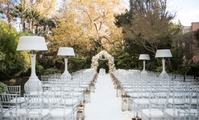 Outdoor Winter Wedding with Heat Lamps
Photography: Samuel Lippke Studios
Read More:
http://www.insideweddings.com/weddings/glamorous-alfresco-ceremony-ballroom-reception-and-after-party/1041/ Wedding ceremony outdoors in January Hotel Bel-Air white aisle chairs lanterns heat lamps flowers