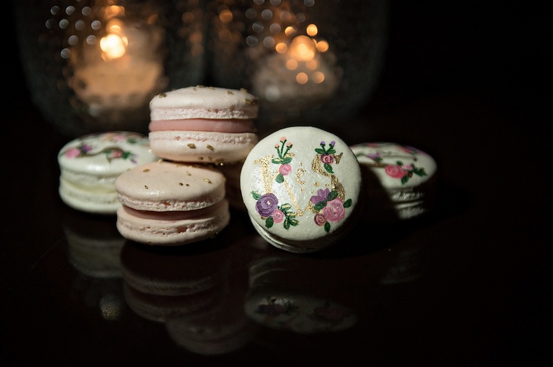 Painted Macarons
Photography: Laurie Bailey Photography
Read More:
http://www.insideweddings.com/weddings/oceanfront-wedding-ceremony-classic-romantic-ballroom-reception/854/ gourmet macarons with paints floral details