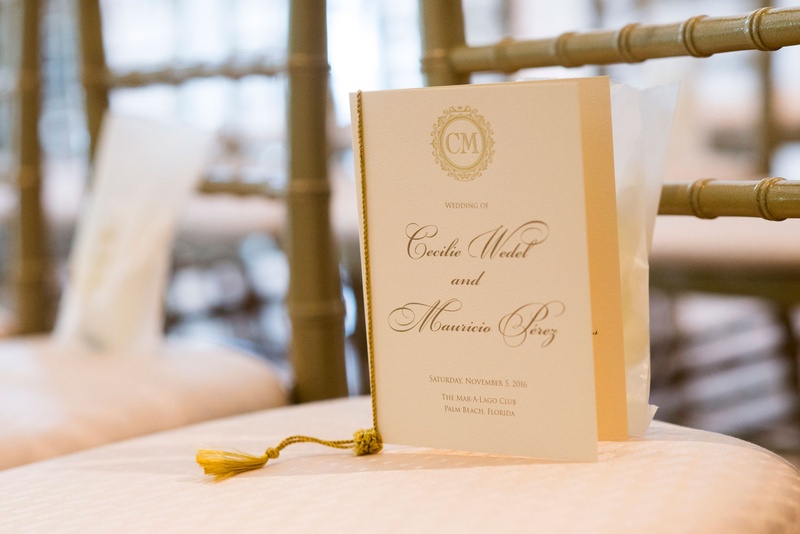 Ivory %26 Gold Wedding Program
Photography: Nancy Cohn Photography
Read More:
http://www.insideweddings.com/weddings/destination-wedding-with-white-gold-color-palette-in-palm-beach/1028/ Wedding ceremony program white stationery gold lettering monogram tie tassel on chair