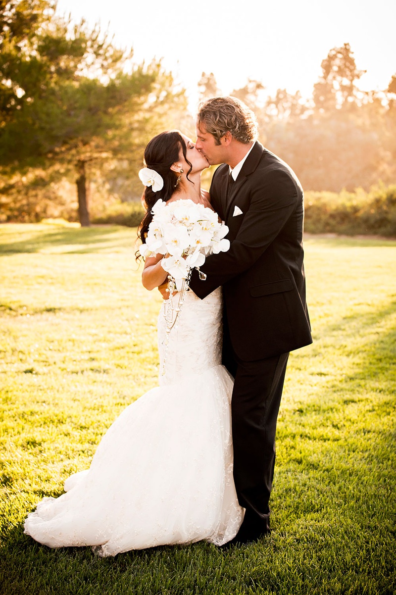 Bride and Groom Share a Kiss
Photography: Boyd Harris Photographs
Read More:
http://www.insideweddings.com/weddings/a-jeweled-floral-wedding-at-fairmont-grand-del-mar-in-san-diego/745/ bride in mermaid gown by romona keveza kisses groom in black tux