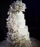 Cascading Flowers Cake
Photography: Gruber Photographers
Read More:
http://www.insideweddings.com/weddings/glamorous-all-white-fall-wedding-in-new-york-city/327/ White round cake with monogram and sugar flower