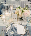 Velvet Blue Napkin at Place Setting
Photography: Palos Studio
Read More:
http://www.insideweddings.com/weddings/ocean-view-ceremony-classic-reception-with-soft-blue-color-scheme/1371/ wedding reception steel blue velvet napkin and linen gold pink white greenery decor
