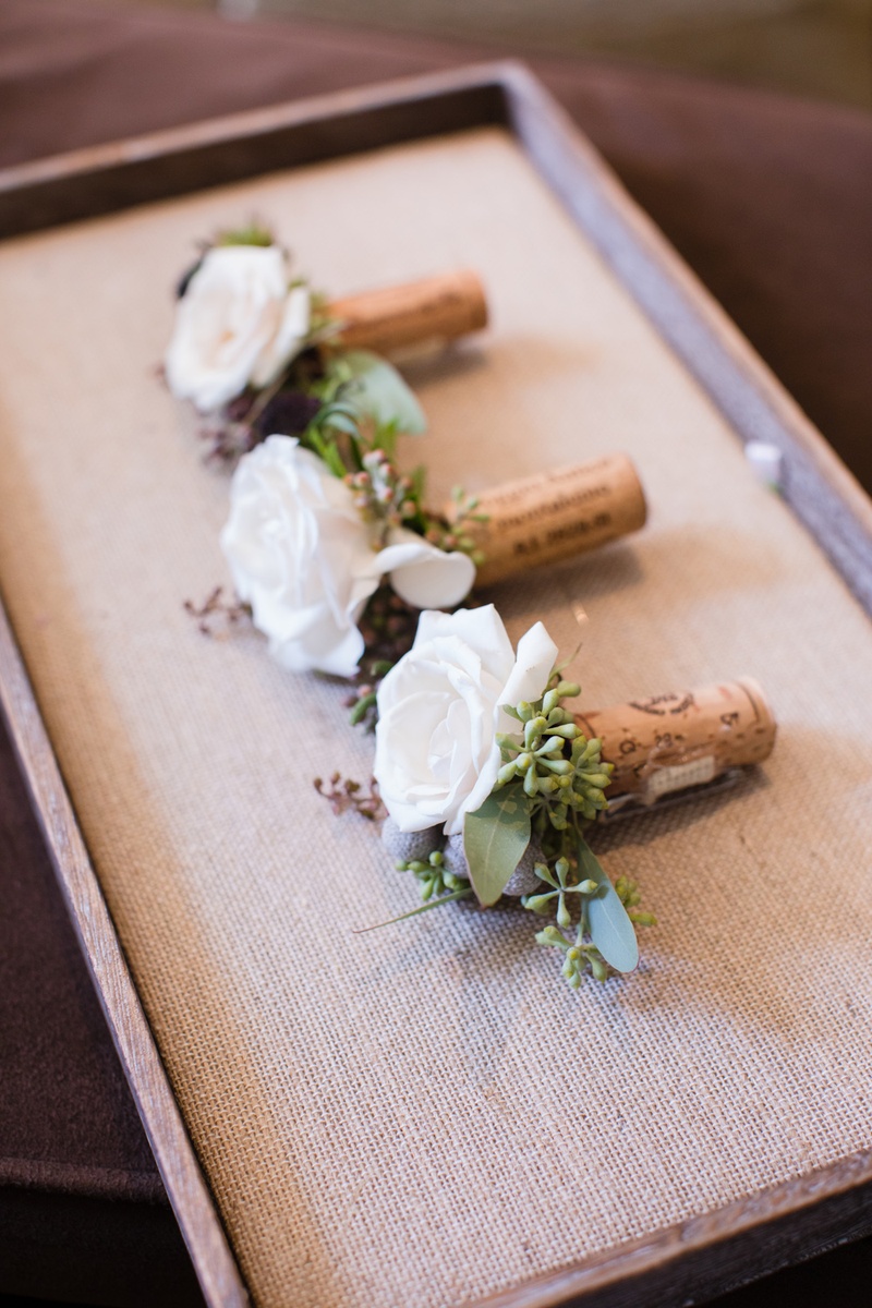 Boutonnieres on Wine Corks
Photography: Acqua Photo
Read More:
http://www.insideweddings.com/weddings/balboa-park-wedding-with-wine-inspired-color-scheme-in-san-diego/948/ Boutonnieres for the best men bridesmes on wine corks with white roses