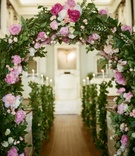 Floral-Embellished Arch
Photography: Adrienne Page
Read More:
http://www.insideweddings.com/weddings/pink-and-white-destination-wedding-in-charleston-south-carolina/542/ Garland of greenery in church with pink peonies
