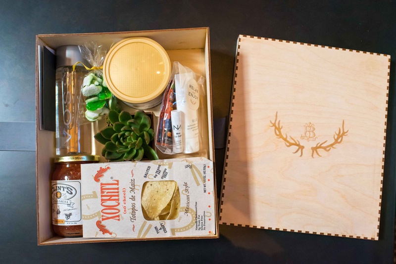 Rustic Welcome Box Favors
Photography: Brett Butterstein Photography
Read More:
http://www.insideweddings.com/weddings/incredible-tented-ceremony-barn-reception-at-ranch-in-aspen/860/ Rustic wedding in aspen colorado with antler monogram chip salsa voss water succulent candy relax