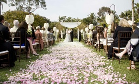Ombré Flower Petal Aisle
Photography: Katie Moos Photography
Read More:
http://www.insideweddings.com/weddings/beachside-ballroom-wedding-in-santa-barbara-california/275/ Pink ombré outdoor wedding ceremony aisle