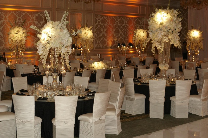 Regal Reception Décor
Photography: KingenSmith
Read More:
http://www.insideweddings.com/weddings/timeless-black-white-wedding-in-chicago-illinois/349/ Chameleon chairs around black wedding tables