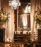Ceremony Floral Arrangements in Fall Colors
Photography: Joe Photo
Read More:
http://www.insideweddings.com/weddings/the-unique-and-intimate-wedding-of-trains-bassist-hector-maldonado/879/ blush, burgundy, green floral arrangement on stand with crystal chandelier at ceremony