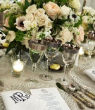 Silver-Rimmed Glassware %26 Monogram Napkins
Photography: KingenSmith
Read More:
http://www.insideweddings.com/weddings/luxe-jewish-wedding-with-personal-details-greenery-chinoiserie/1152/ wedding reception place setting crystal charger monogram napkin menu card anemone rose centerpiece