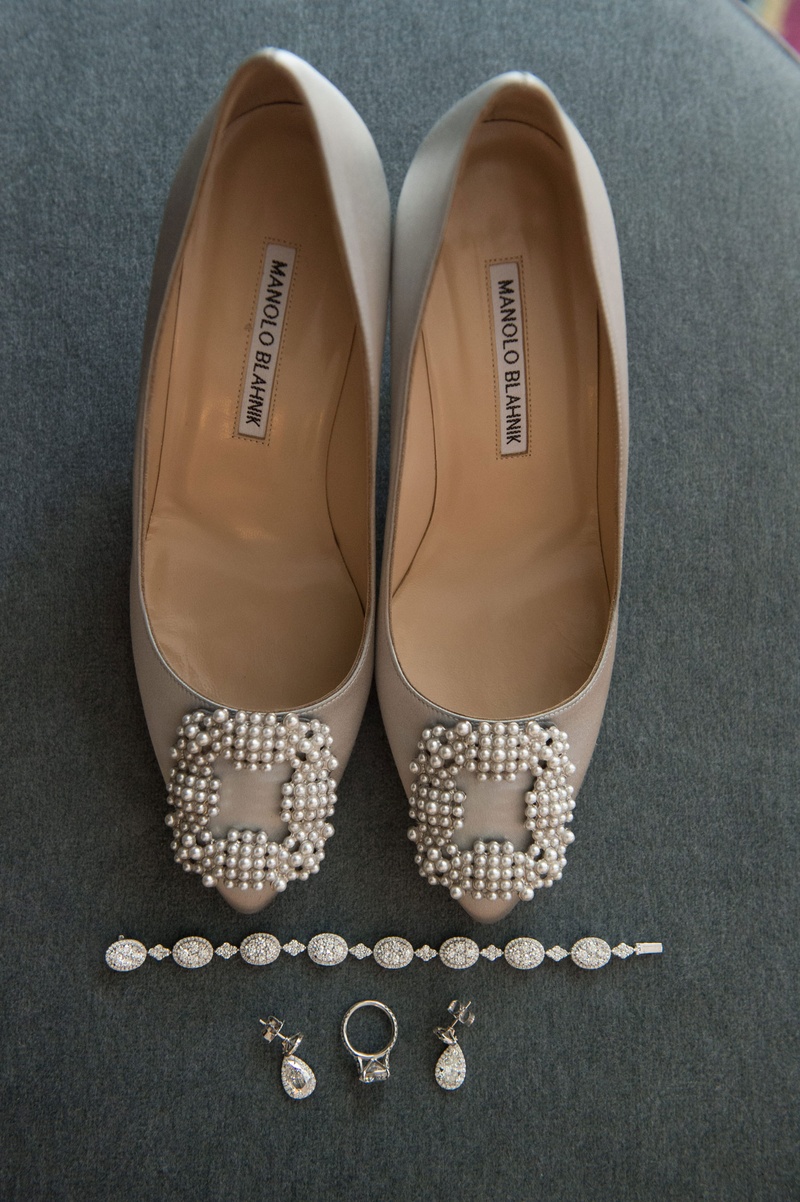 Nude Manolo Blahnik Shoes
Photography: John Solano Photography
Read More:
http://www.insideweddings.com/weddings/an-opulent-garden-ceremony-ballroom-reception-in-beverly-hills/986/ Bride's day of wedding accessories bracelet engagement ring earrings manolo blahnik shoes pearls