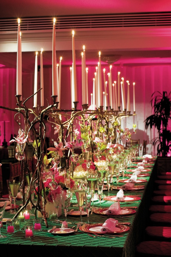 Pink and Green Reception
Photography: Mermin + Christie Photographers
Read More:
http://www.insideweddings.com/weddings/tropical-theme-beach-wedding-in-naples-florida/184/ table covered with green tablecloth and candelabras of twisted branches