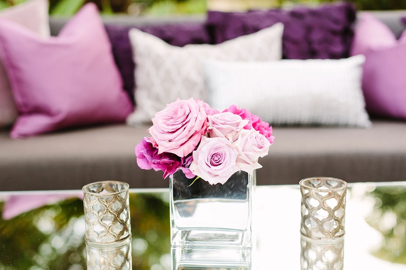 Small Pink and Purple Floral Arrangement on Mirror Table
Photography: Katie Stoops Photography
Read More:
http://www.insideweddings.com/weddings/bright-playful-oceanfront-wedding-with-delectable-four-course-menu/757/ pink and purple floral arrangements roses in glass vase on mirror table ceremony