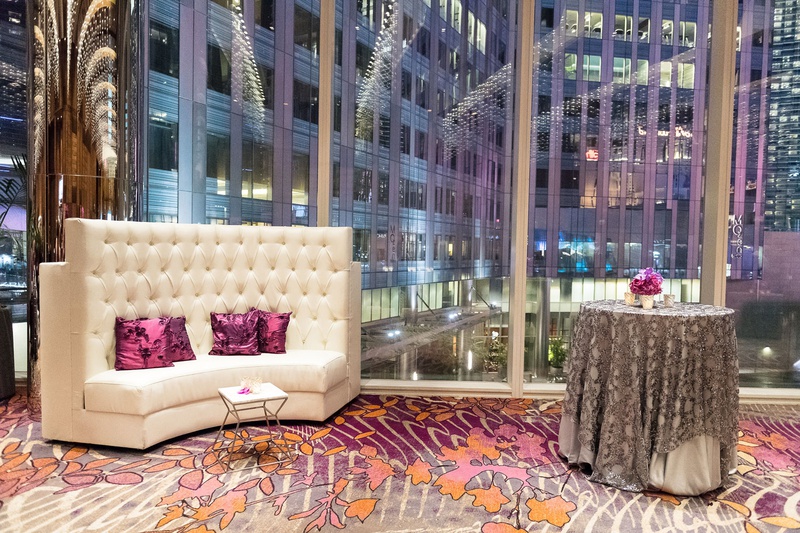 Lounge Area with View of Las Vegas
Photography: Brian Leahy Photography
Read More:
http://www.insideweddings.com/weddings/a-hawaiian-couples-luxurious-destination-wedding-in-las-vegas/1226/ elegant las vegas wedding, lounge area with high back white sofa, silver sequin table cloth