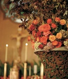 Ceremony Decor
Photography: Denis Reggie Photographers
Read More:
http://www.insideweddings.com/weddings/sophisticated-tented-farm-wedding-in-northern-california/211/ Wedding ceremony arrangement of orange, yellow, and green flowers with branches of dry leaves