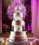 Swarovski Crystal Cake
Photography: Walters %26 Walters
Read More:
http://www.insideweddings.com/weddings/traditional-greek-ceremony-at-duke-chapel-lavish-reception/373/ Five layer cake with orchid and crystal details on custom stand