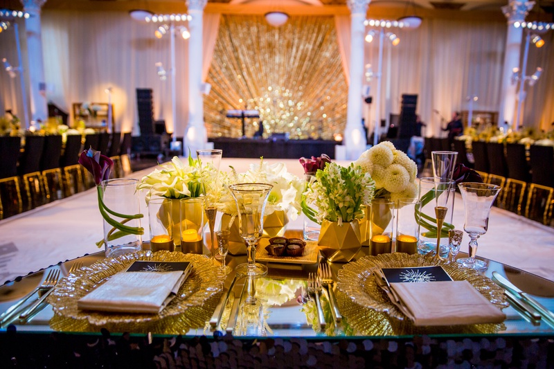 Glass-Topped Sweetheart Table
Photography: Laura Grier of Beautiful Day Photography
Read More:
http://www.insideweddings.com/weddings/glamorous-art-deco-inspired-wedding-in-downtown-los-angeles/1162/ vibiana wedding reception black and gold art deco, glass-topped sweetheart table