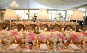 Head Table with White %26 Pink Floral Runner
Photography: Karlisch Studio
Read More:
http://www.insideweddings.com/weddings/southern-chic-wedding-in-oklahoma-with-performance-by-boyz-ii-men/697/ Wedding reception table with mirror top, runner of white hydrangeas, tulips, roses, pink roses