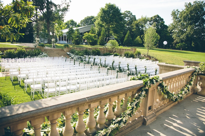 Backyard Ceremony Decorations
Photography: David %26 Tammy Molnar
Read More:
http://www.insideweddings.com/weddings/an-exquisite-backyard-wedding-in-tennessee/532/ Garlands of greenery on stone balcony pillars