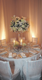 All-White Reception Décor
Photography: Dalal Photography
Read More:
http://www.insideweddings.com/weddings/korean-american-wedding-at-the-four-seasons-los-angeles-at-beverly/178/ Round tables with white flower candelabra
