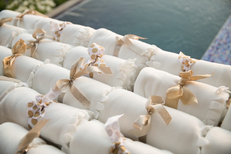 Blankets for a Chilly Evening
Photography: Michael Segal Photography
Read More:
http://www.insideweddings.com/weddings/environmentally-friendly-wedding-with-stunning-views-in-malibu/1062/ fleece blankets to give guests as it got cold during the reception