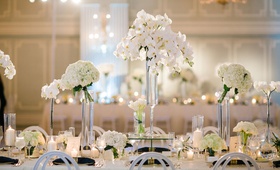 White Flowers %26 Candlelight
Photography: Michelle Beller Photography
Read More:
http://www.insideweddings.com/weddings/classic-ceremony-beachfront-ballroom-reception-in-santa-monica/1234/ wedding reception flower centerpieces white orchid hydrangea in tall vases white chairs