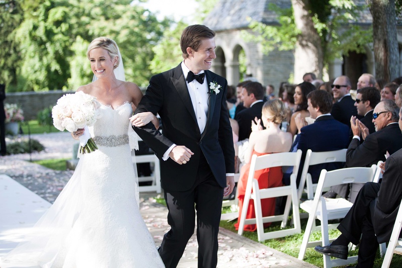 Newlyweds Walk Up the Alfresco Aisle
Photography: Michael Bambino %26 Co.
Read More:
http://www.insideweddings.com/weddings/whimsical-open-air-secret-garden-wedding-with-soft-spring-hues/777/ happy newlyweds walk back up the aisle after their outdoor ceremony
